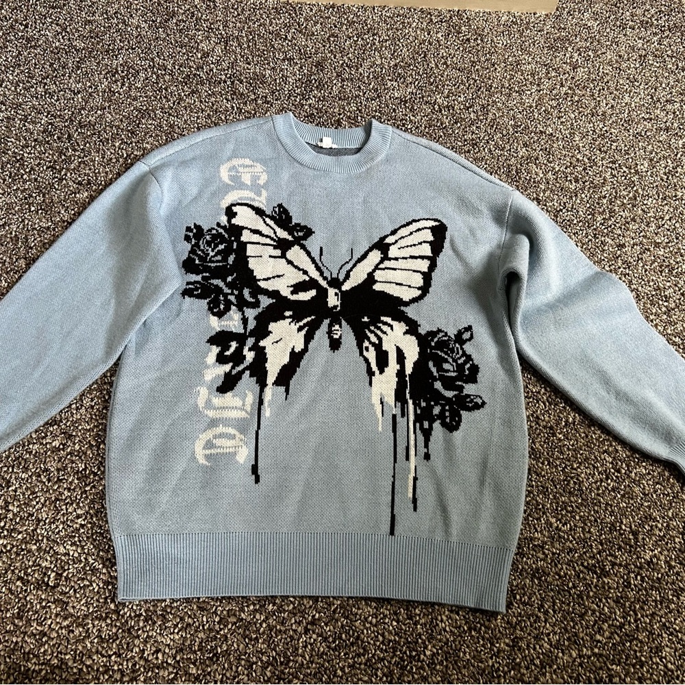 Garage Blue and Black Crewneck Sweater with Artistic Butterfly Design